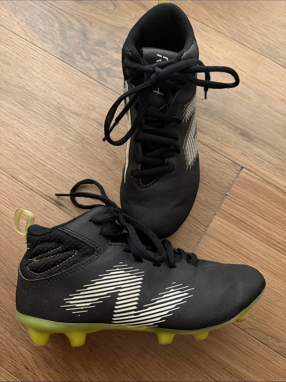 New Balance Kids Black and Lime Soccer Cleats with White Logo